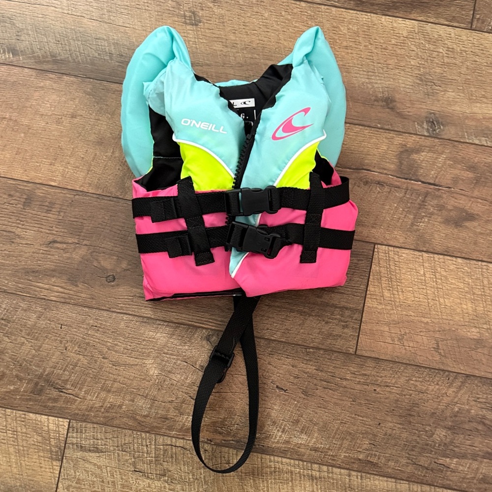O'Neill infant Life Vest - Pink, Blue, and Black